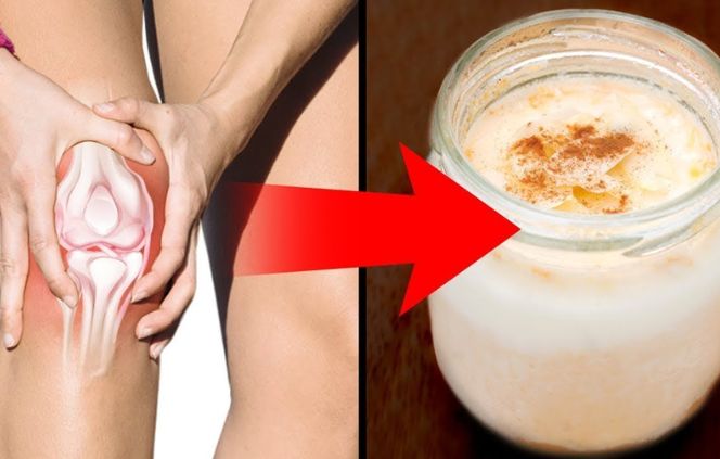 Une défense de mammouth laineux émergeant du pergélisol.